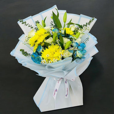 Lilies & Yellow Chrysanthemum Floral Arrangement